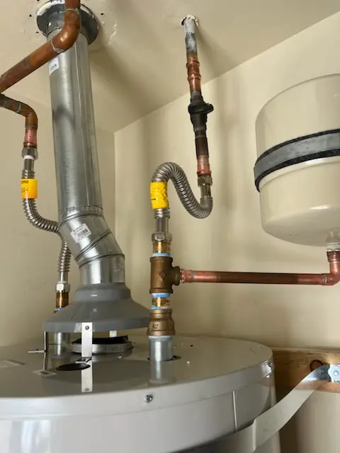 Water heater installation and plumbing repair in Country Club